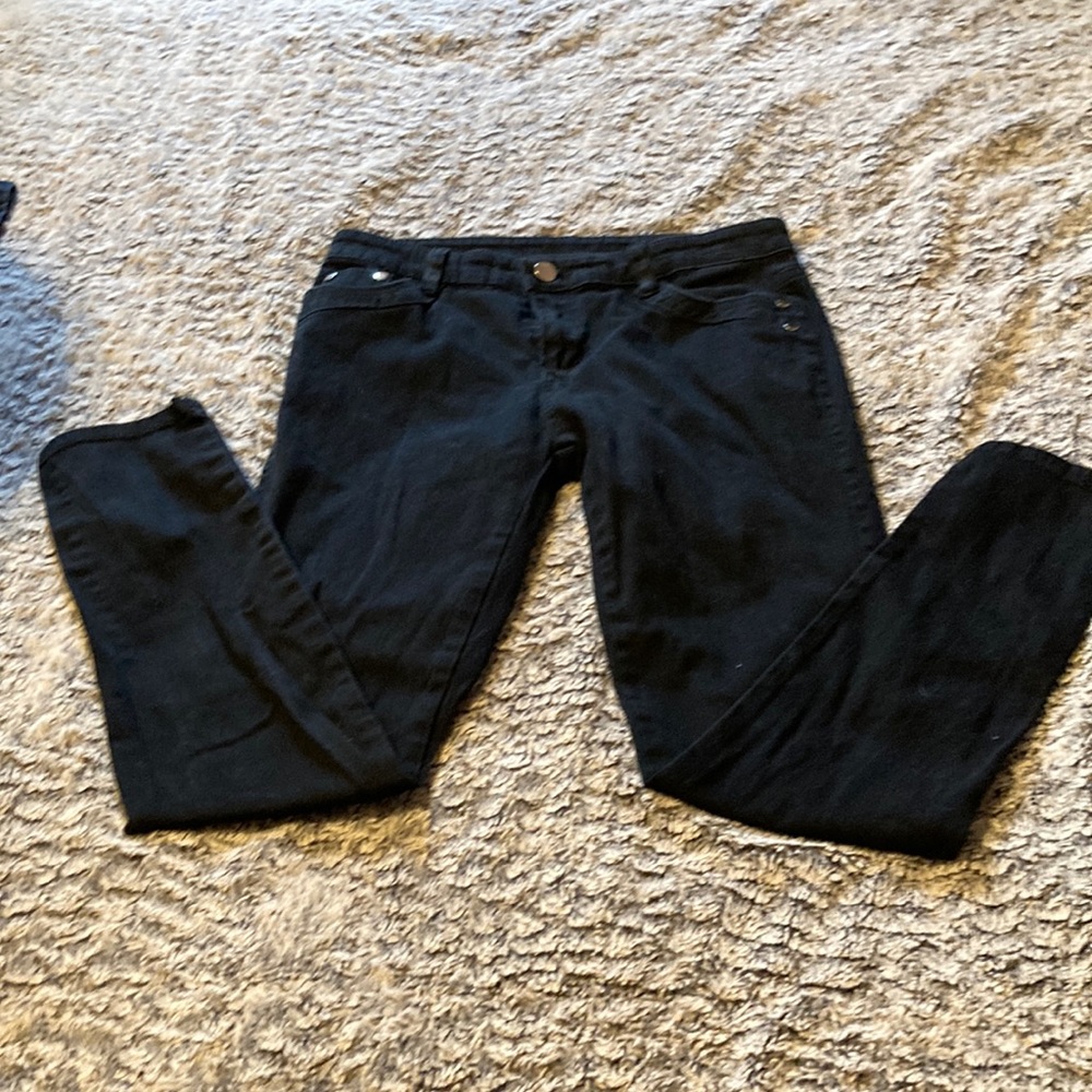 New Item-3/$30-Black skinny jeans. Two belt loops torn-Size very small 29